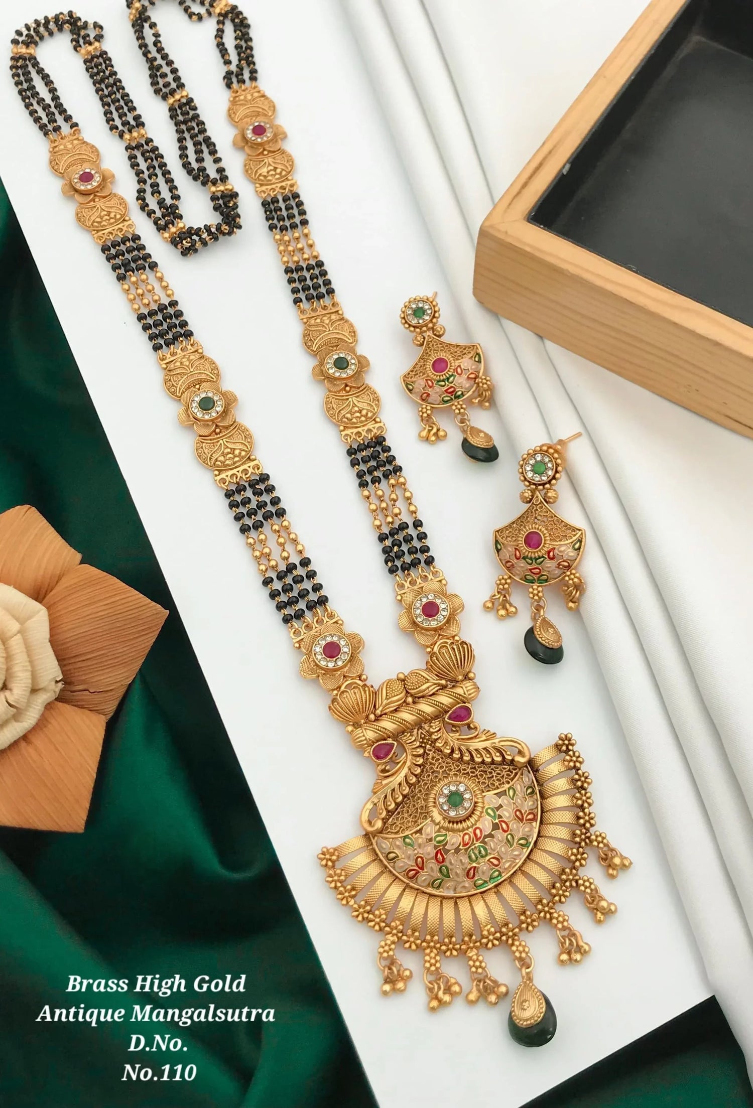 Brass high gold antique mangalsutra necklace and matching earrings with black beads and colorful stones