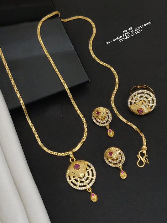 24-inch gold chain pendant with matching Butti ring and earrings featuring red stones and white crystals on black background