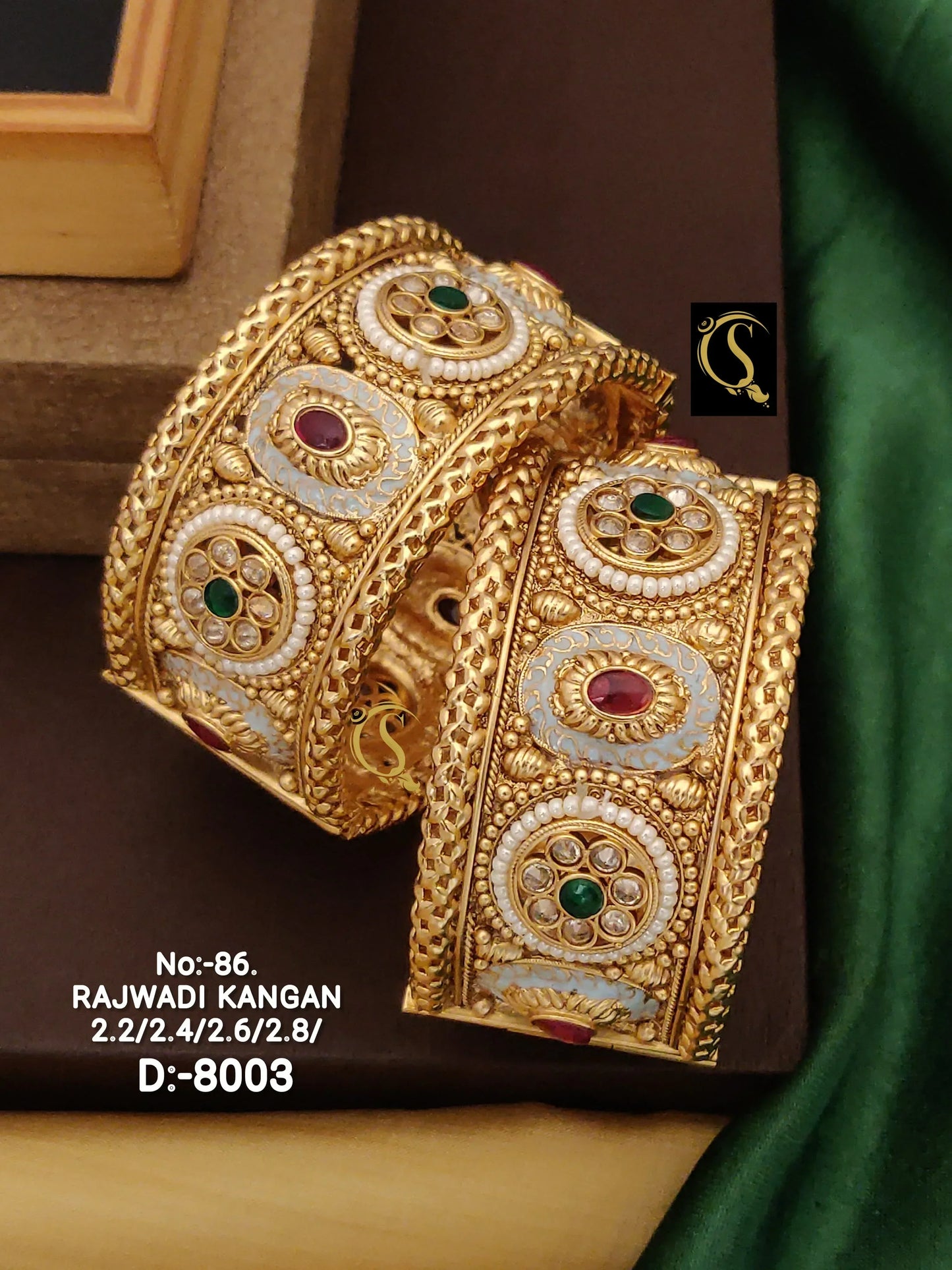 Pair of ornate Rajwadi Kangan gold bangles with intricate gemstone and pearl designs